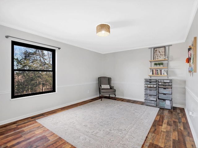 unfurnished room with dark hardwood / wood-style flooring and ornamental molding