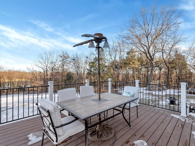 view of snow covered deck