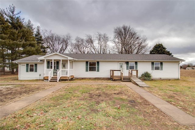 ranch-style home with a front yard