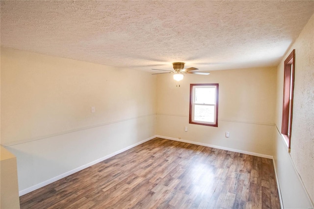 empty room with wood-type flooring, a textured ceiling, and ceiling fan