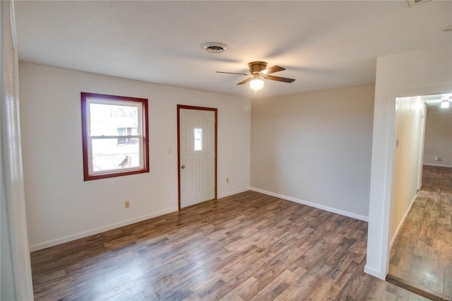 foyer with wood-type flooring and ceiling fan