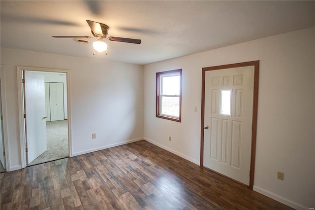 entrance foyer with ceiling fan and dark hardwood / wood-style floors