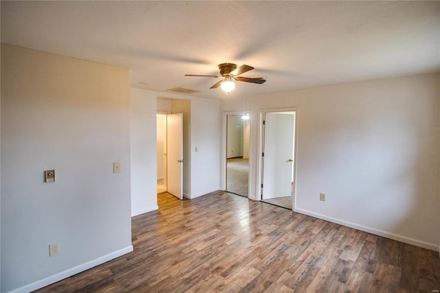 unfurnished bedroom with wood-type flooring and ceiling fan