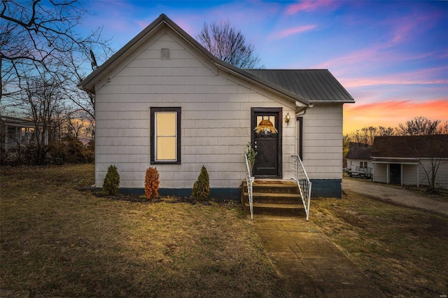 bungalow with a lawn