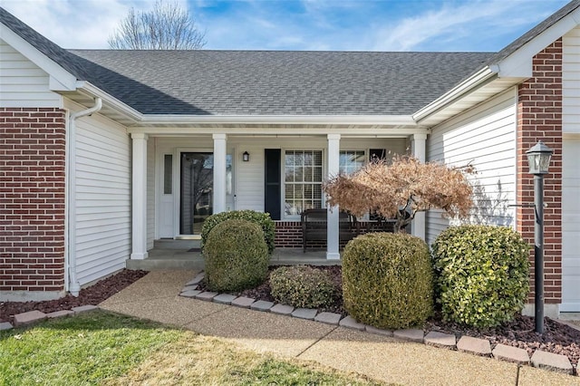 property entrance with covered porch