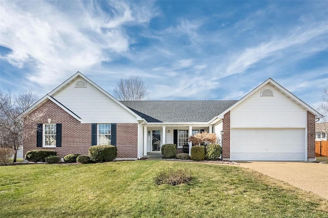 ranch-style home featuring a garage and a front yard