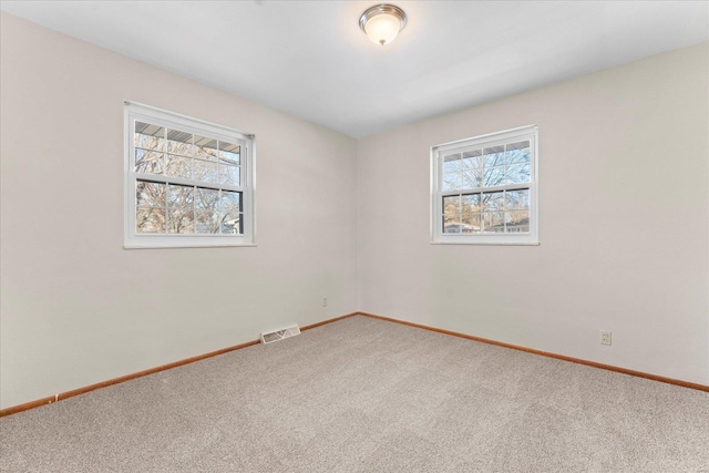 view of carpeted spare room