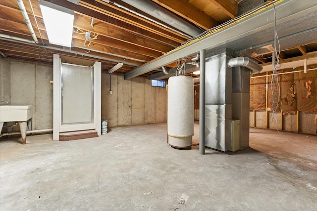 basement with heating unit and gas water heater