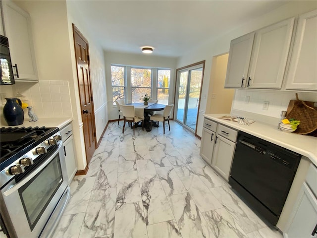 kitchen featuring backsplash, dishwasher, and stainless steel gas stove