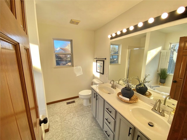 full bathroom with vanity, toilet, and separate shower and tub