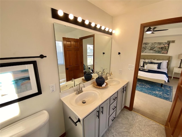 bathroom with vanity and toilet