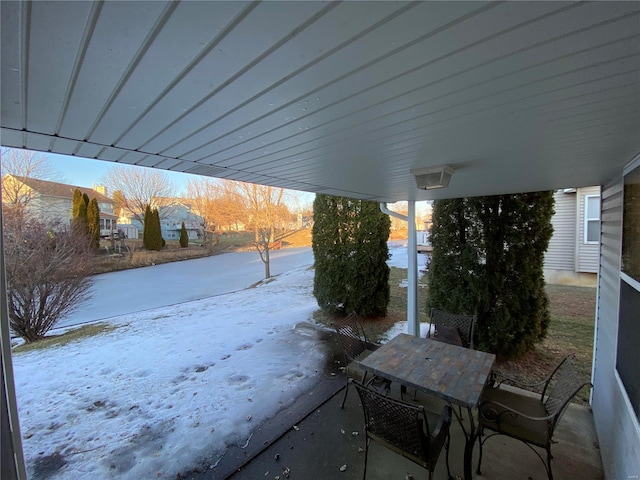 view of snow covered patio