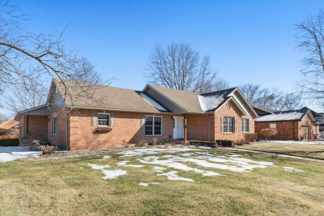 ranch-style house with a front yard