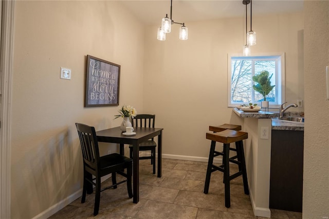 dining area featuring sink