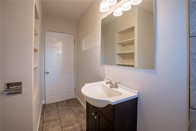 bathroom with vanity and built in features