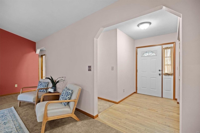 entryway with light hardwood / wood-style flooring