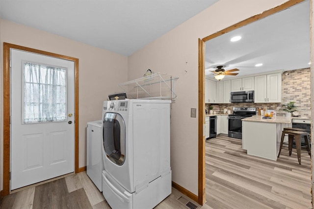 washroom with ceiling fan and light wood-type flooring