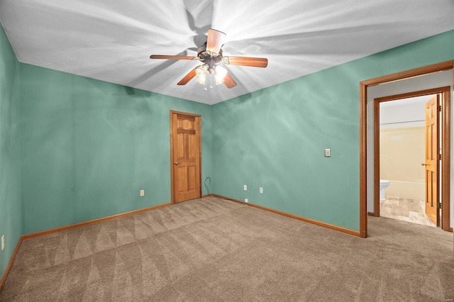 unfurnished room with carpet floors and ceiling fan