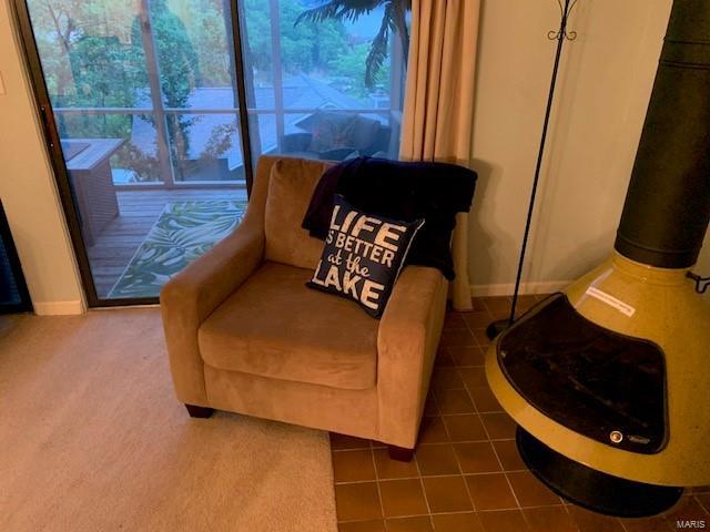 sitting room featuring tile patterned flooring