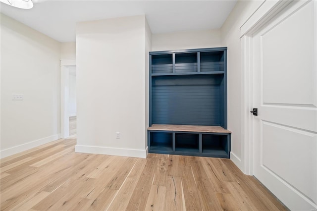 mudroom with light hardwood / wood-style floors