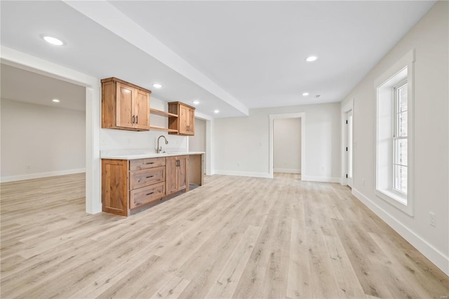 kitchen with sink and light wood-type flooring