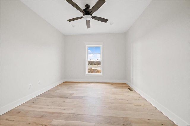 unfurnished room featuring ceiling fan and light wood-type flooring