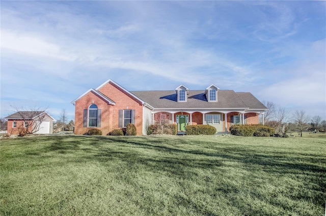 view of front facade with a garage and a front lawn