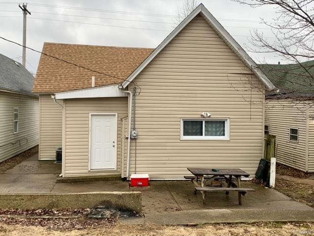 back of house with a patio area