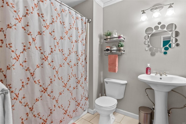 bathroom featuring sink, a shower with shower curtain, tile patterned floors, and toilet