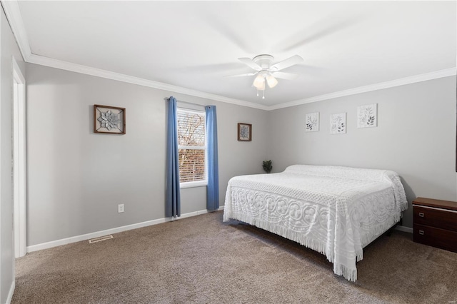 bedroom with crown molding, ceiling fan, and carpet