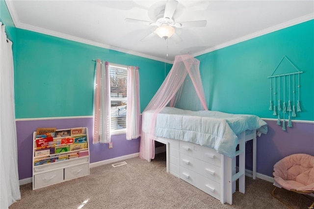 bedroom with light carpet, crown molding, and ceiling fan