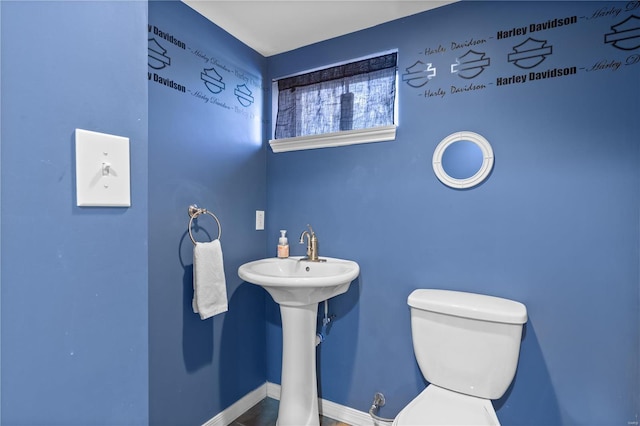 bathroom with sink and toilet