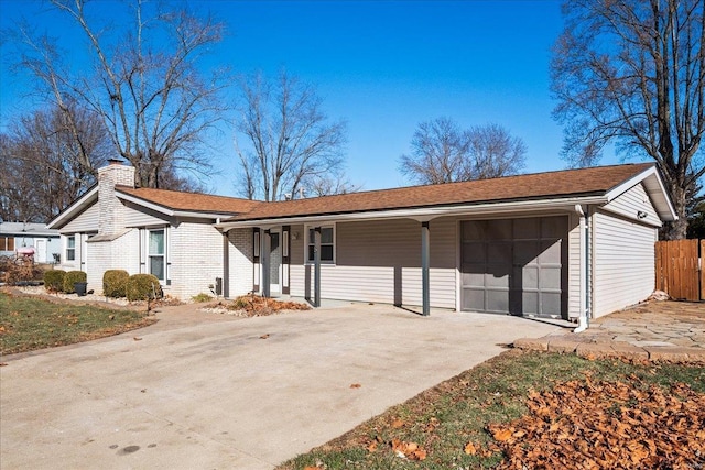 single story home featuring a garage