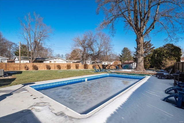 view of pool featuring a patio, a yard, and central AC unit