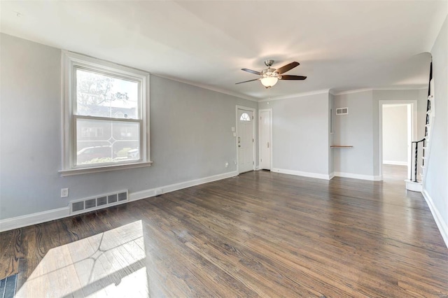 unfurnished living room with ornamental molding, dark hardwood / wood-style floors, and ceiling fan