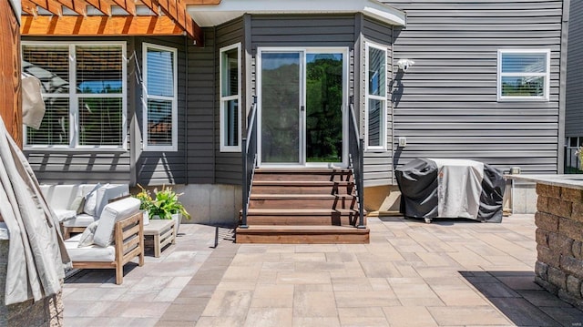 view of patio featuring a grill