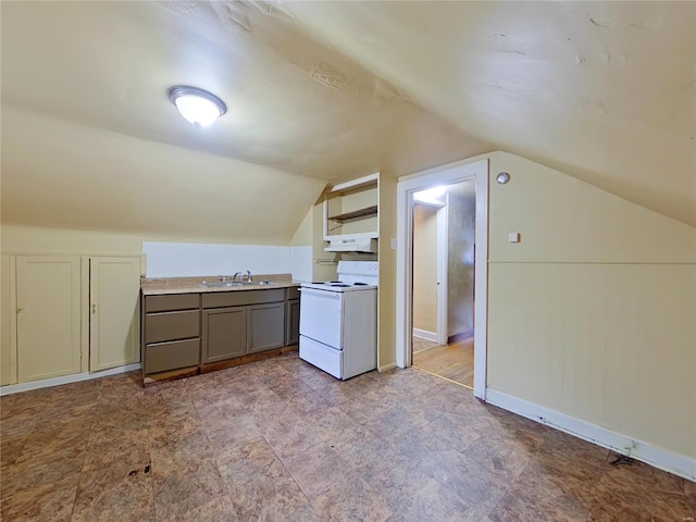 kitchen with lofted ceiling, sink, and electric range