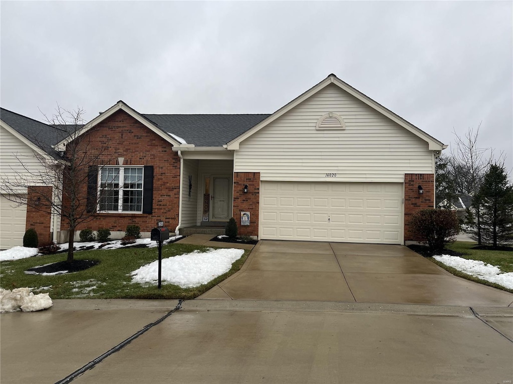 single story home with a garage