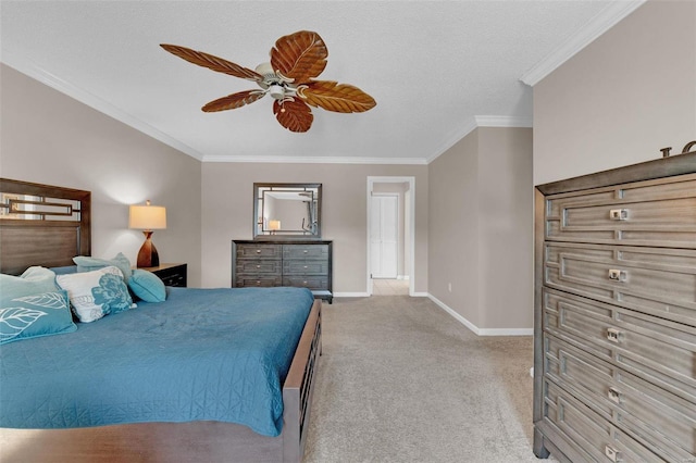 carpeted bedroom featuring ceiling fan, ornamental molding, and baseboards