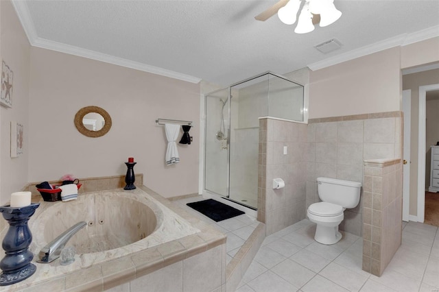 bathroom featuring ornamental molding, tile patterned flooring, a shower stall, and toilet