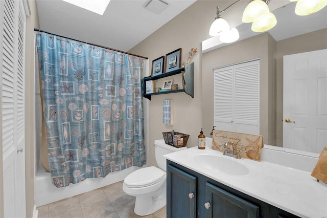 bathroom with visible vents, toilet, shower / tub combo with curtain, tile patterned flooring, and vanity