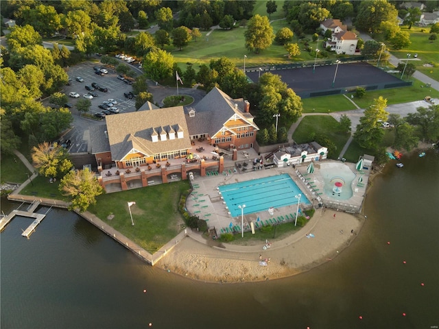 birds eye view of property featuring a water view