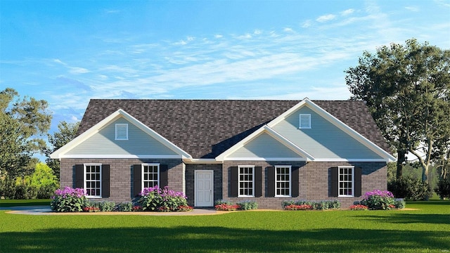 view of front of property featuring a shingled roof and a front yard