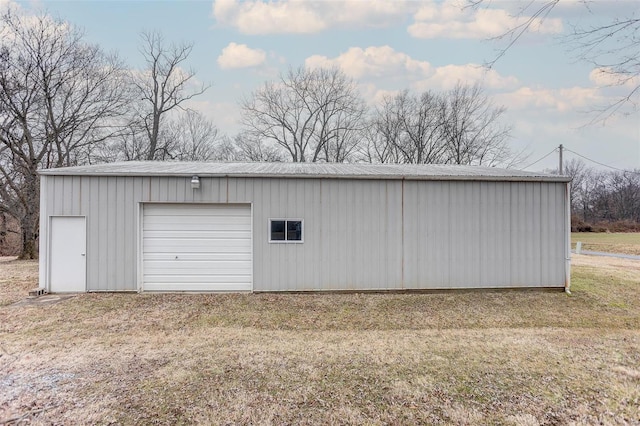 garage with a lawn