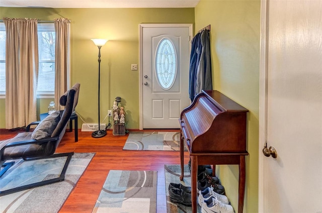 foyer entrance with hardwood / wood-style floors