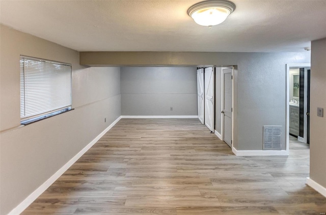 empty room featuring hardwood / wood-style floors