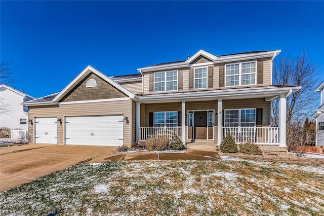 view of front of home featuring a garage and covered porch