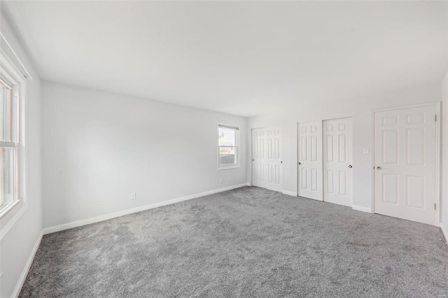 unfurnished room featuring carpet floors