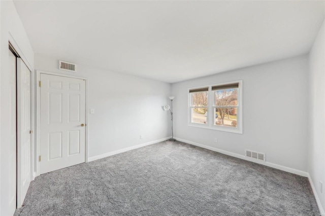 view of carpeted spare room