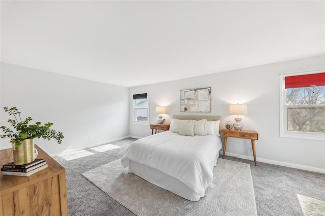 bedroom with light colored carpet